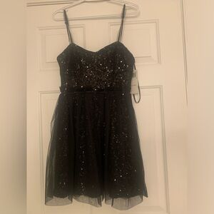 Black tulle and sequin sweetheart neckline mini dress